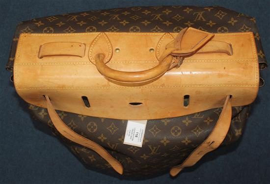 A Louis Vuitton travel bag, length 22in. not incl. handle